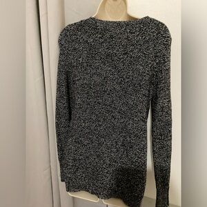 Black sweater from loft brand new never worn before. Woven.